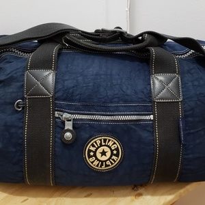 Kipling Navy Duffel Bag with Black Straps